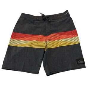 Quick silver high‎ line swim trunks yellow stripe size 32. Tie front with fly.